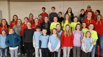 strahlende Gesichter nach erfolgreicher Teilnahme